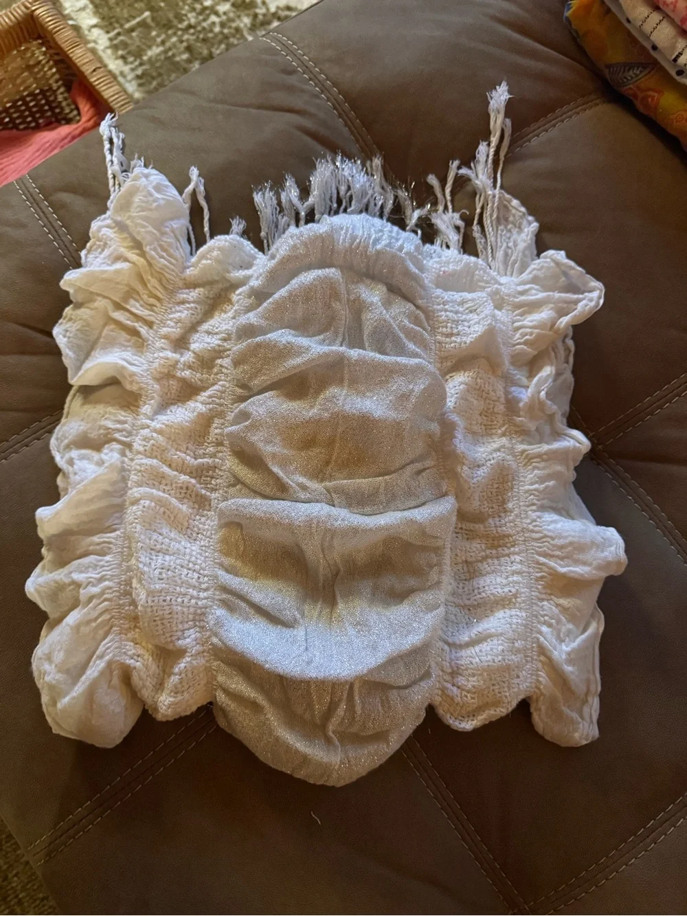 12 scarfs. All different styles and colors. Selling in a lot. All for